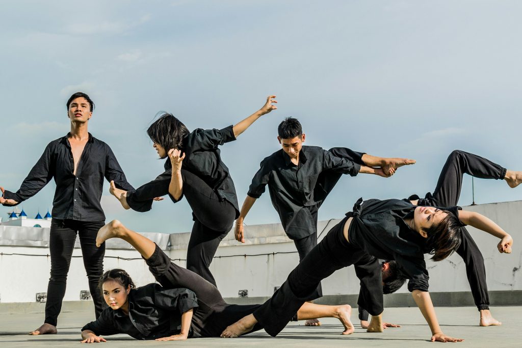 martial arts practitioners in black robes