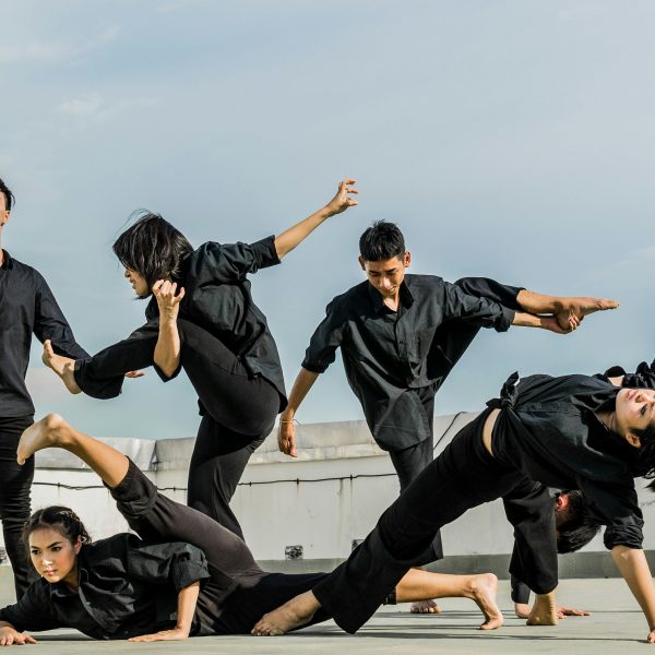 martial arts practitioners in black robes
